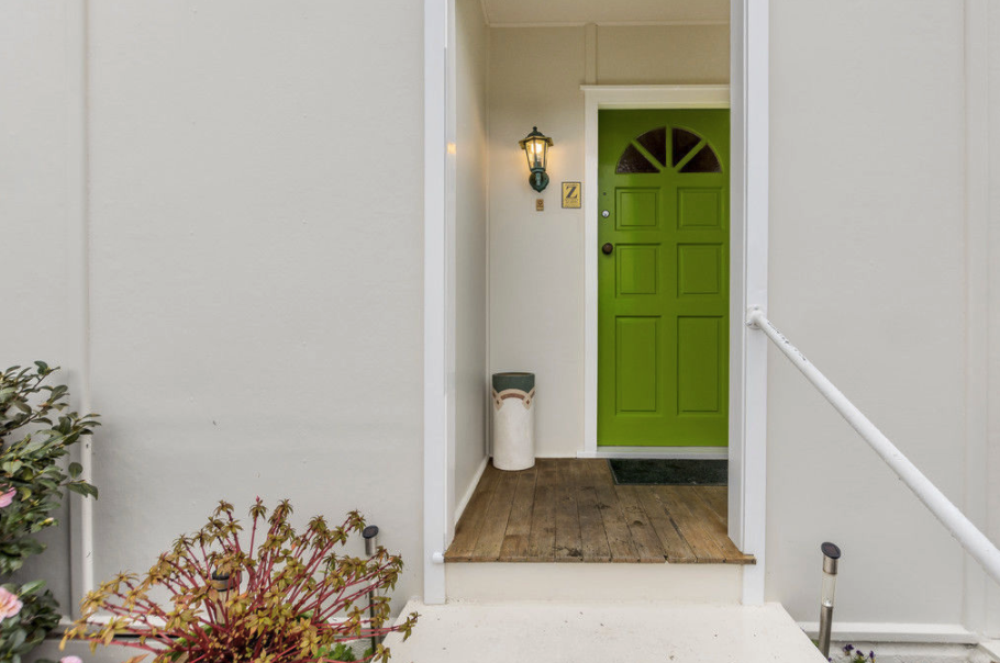 Make a statement in a small space with a coloured front door